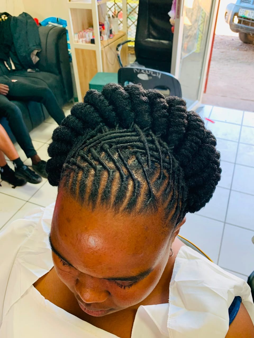Statement braided updo hairstyle